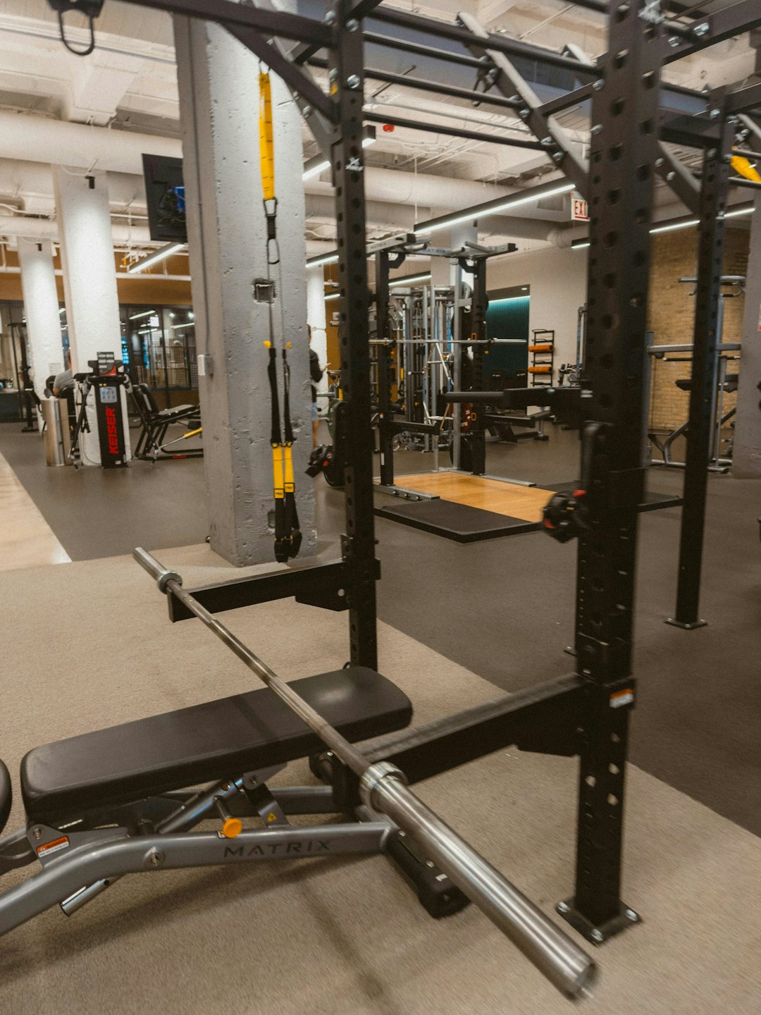 gym-equipment-including-a-barbell-and-weight-bench-ppf5-js3lag